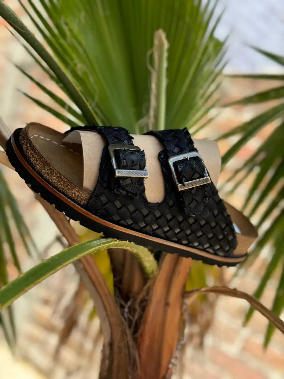 Botas Hasta La Muerte black Petatillo huaraches with cork footbed and Vibram sole handcrafted in León Mexico.