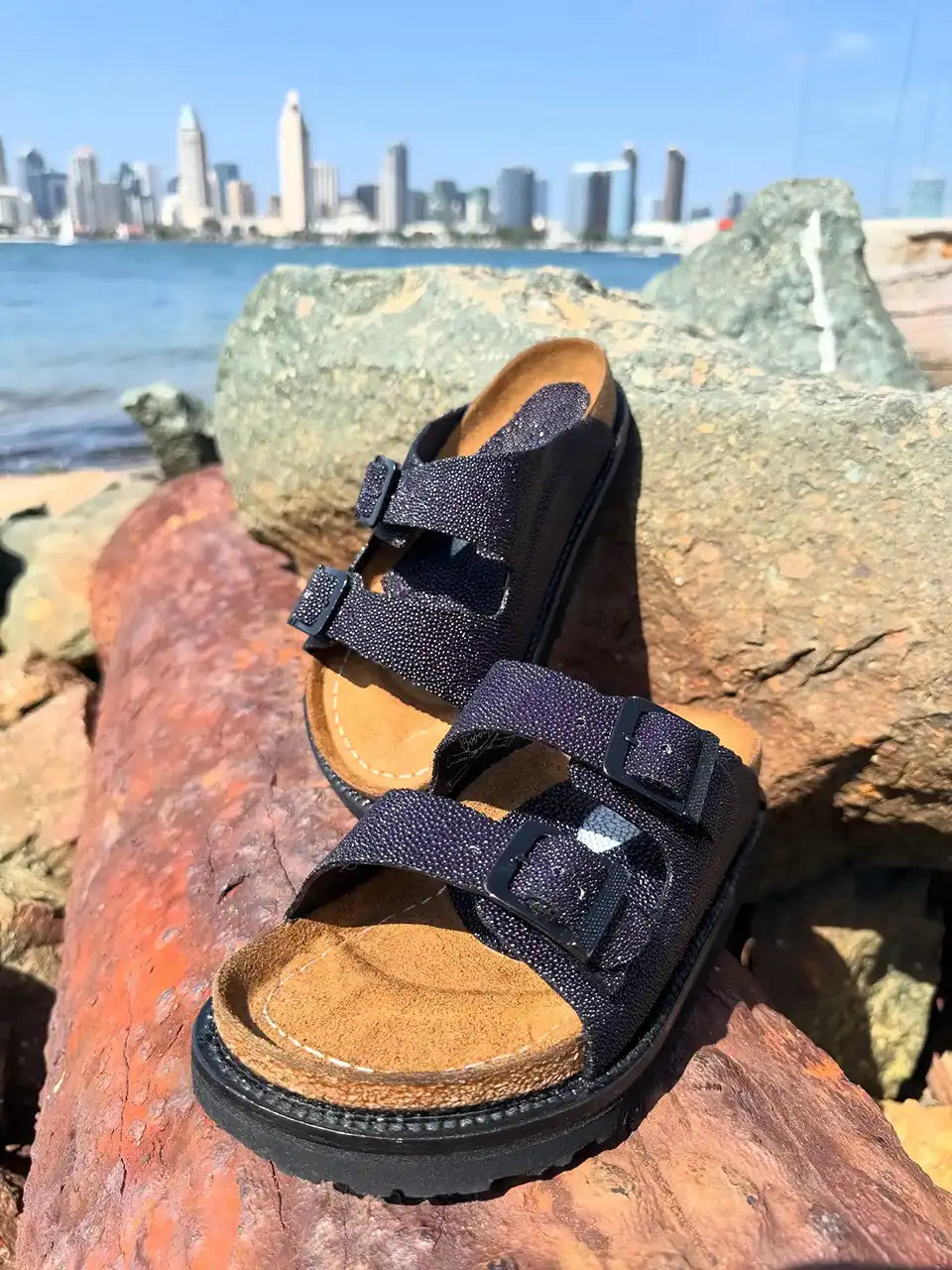 Botas Hasta La Muerte navy pearl stingray huaraches with cork footbed and Vibram sole handcrafted in León Mexico.