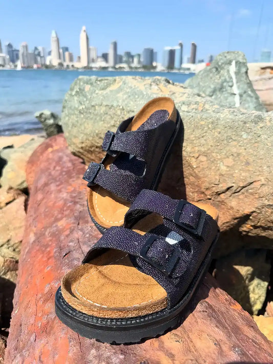 Botas Hasta La Muerte navy pearl stingray huaraches with cork footbed and Vibram sole handcrafted in León Mexico.