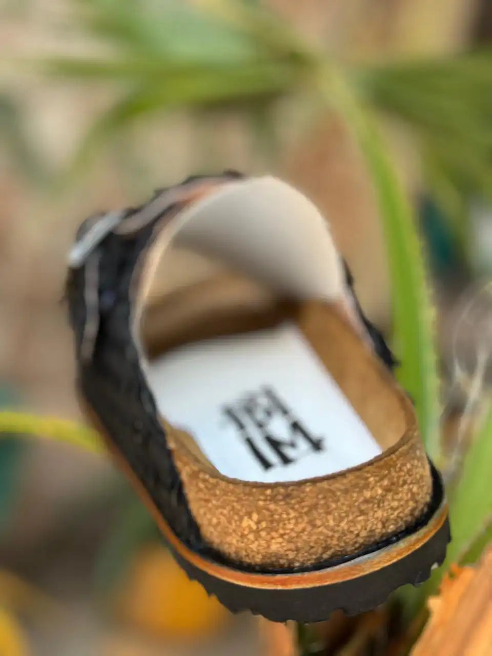 Botas Hasta La Muerte black Petatillo huaraches with cork footbed and Vibram sole handcrafted in León Mexico.