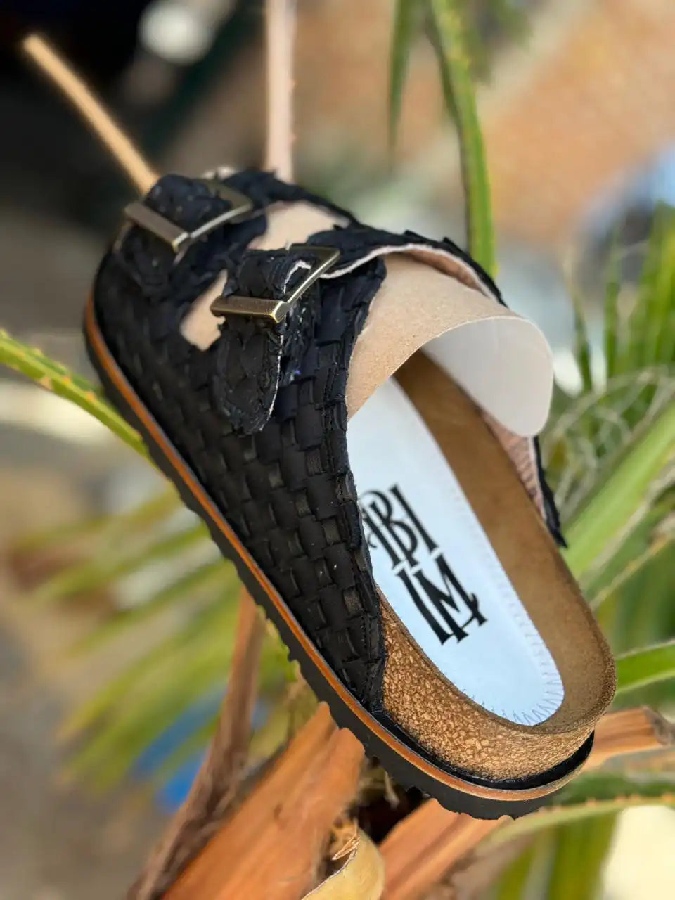 Botas Hasta La Muerte black Petatillo huaraches with cork footbed and Vibram sole handcrafted in León Mexico.