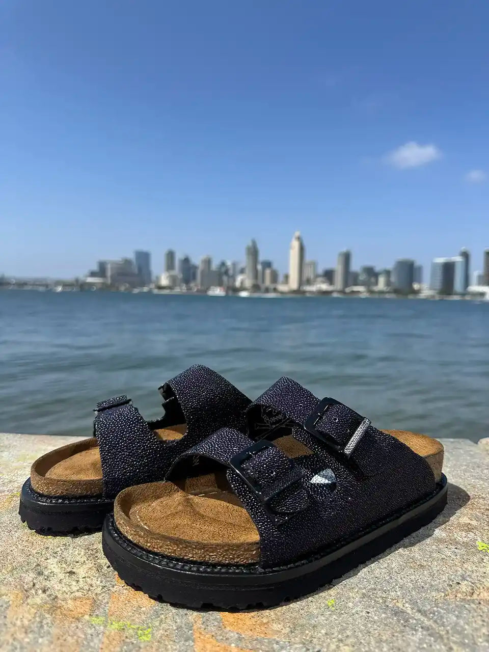 Botas Hasta La Muerte navy pearl stingray huaraches with cork footbed and Vibram sole handcrafted in León Mexico.