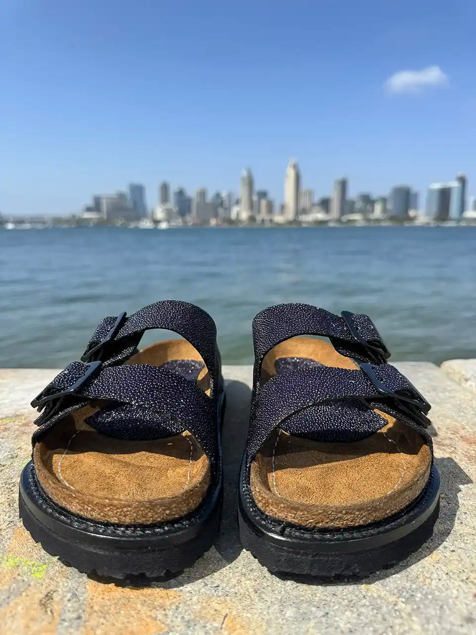 Botas Hasta La Muerte navy pearl stingray huaraches with cork footbed and Vibram sole handcrafted in León Mexico.