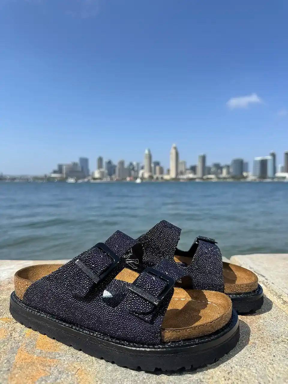 Botas Hasta La Muerte navy pearl stingray huaraches with cork footbed and Vibram sole handcrafted in León Mexico.