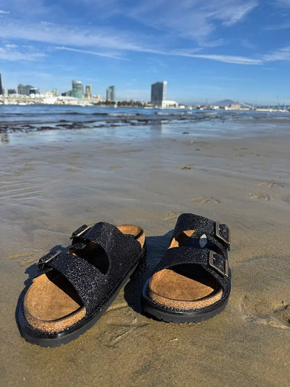 Botas Hasta La Muerte black pearl stingray huaraches with cork footbed and Vibram sole handcrafted in León Mexico.
