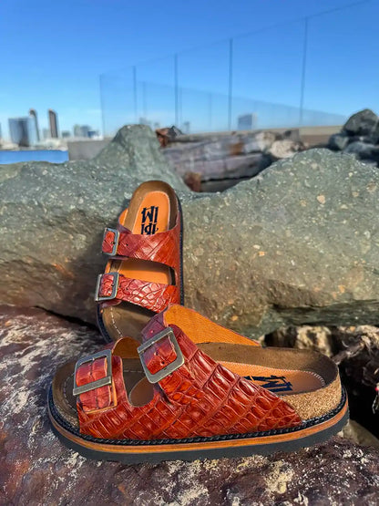 Botas Hasta La Muerte alligator leather huaraches with cork footbed and Vibram sole handcrafted in León Mexico.