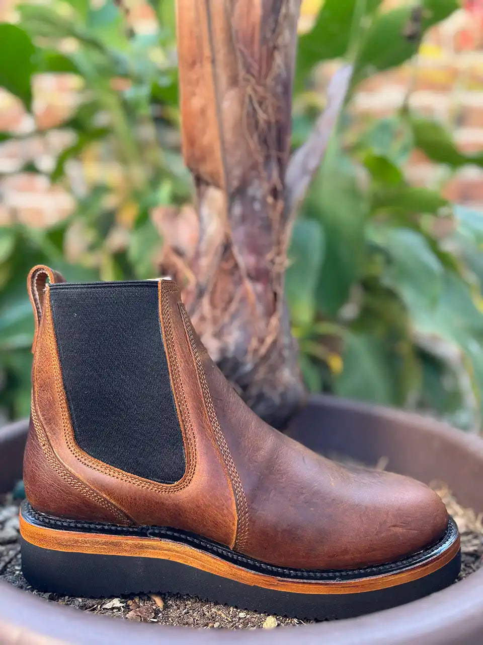 Botas Hasta La Muerte brown oil tanned leather Chelsea boots with Vibram wedge soles handcrafted in León Mexico.