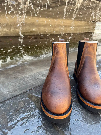 Botas Hasta La Muerte brown oil tanned leather Chelsea boots with Vibram wedge soles handcrafted in León Mexico.