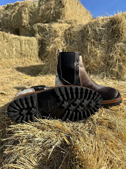 Botas Hasta La Muerte cowhide hair on hide Chelsea boots with lug soles handcrafted in León Mexico.
