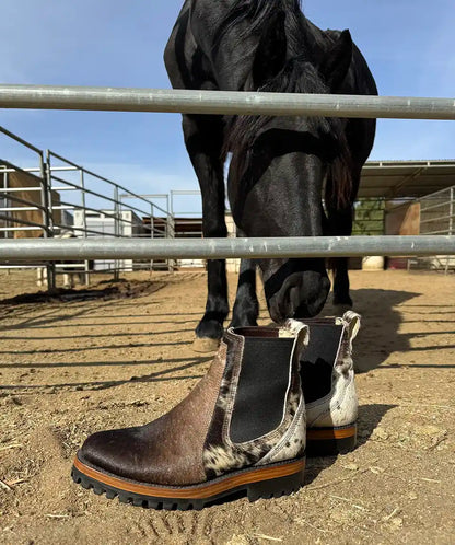 Botas Hasta La Muerte cowhide hair on hide Chelsea boots with lug soles handcrafted in León Mexico.
