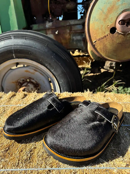 Botas Hasta La Muerte black cowhide clogs with cork footbed and Vibram sole handcrafted in León Mexico.