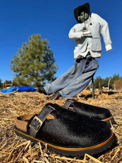 Botas Hasta La Muerte black cowhide clogs with cork footbed and Vibram sole handcrafted in León Mexico.