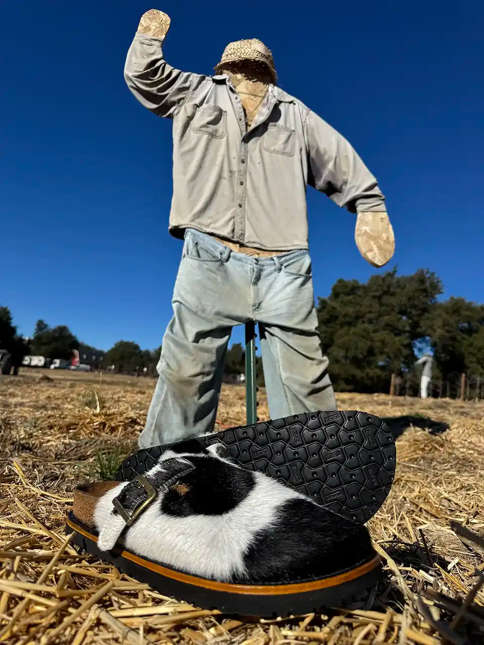 Botas Hasta La Muerte black and white cowhide clogs with cork footbed and Vibram sole handcrafted in León Mexico.