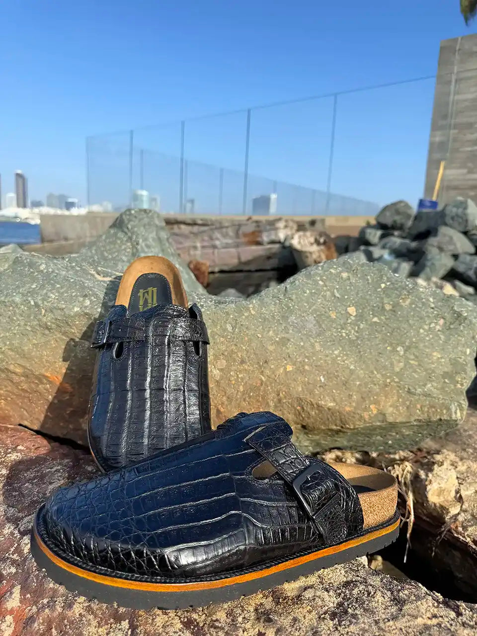 Botas Hasta La Muerte black alligator leather clogs with cork footbed and Vibram sole handcrafted in León Mexico.