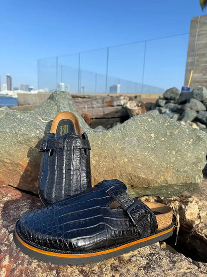 Botas Hasta La Muerte black alligator leather clogs with cork footbed and Vibram sole handcrafted in León Mexico.