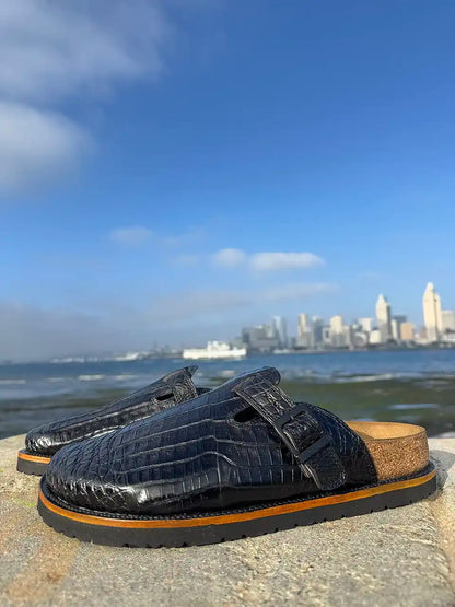 Botas Hasta La Muerte black alligator leather clogs with cork footbed and Vibram sole handcrafted in León Mexico.