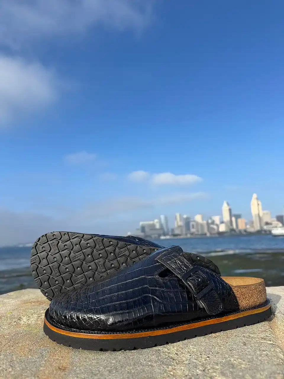 Botas Hasta La Muerte black alligator leather clogs with cork footbed and Vibram sole handcrafted in León Mexico.