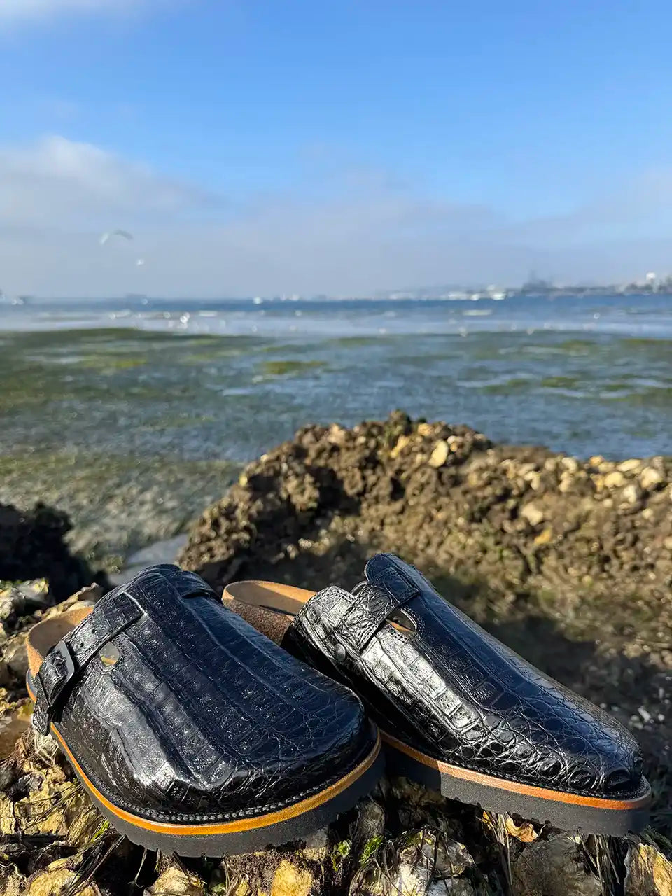 Botas Hasta La Muerte black alligator leather clogs with cork footbed and Vibram sole handcrafted in León Mexico.