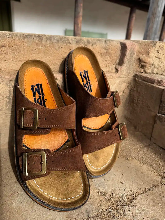 Botas Hasta La Muerte brown roughout cowhide huaraches with cork footbed and Vibram sole handcrafted in León Mexico.