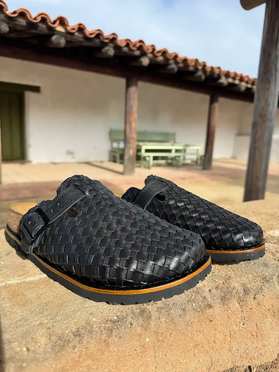 Botas Hasta La Muerte black Petatillo clogs with cork footbed and Vibram sole handcrafted in León Mexico.