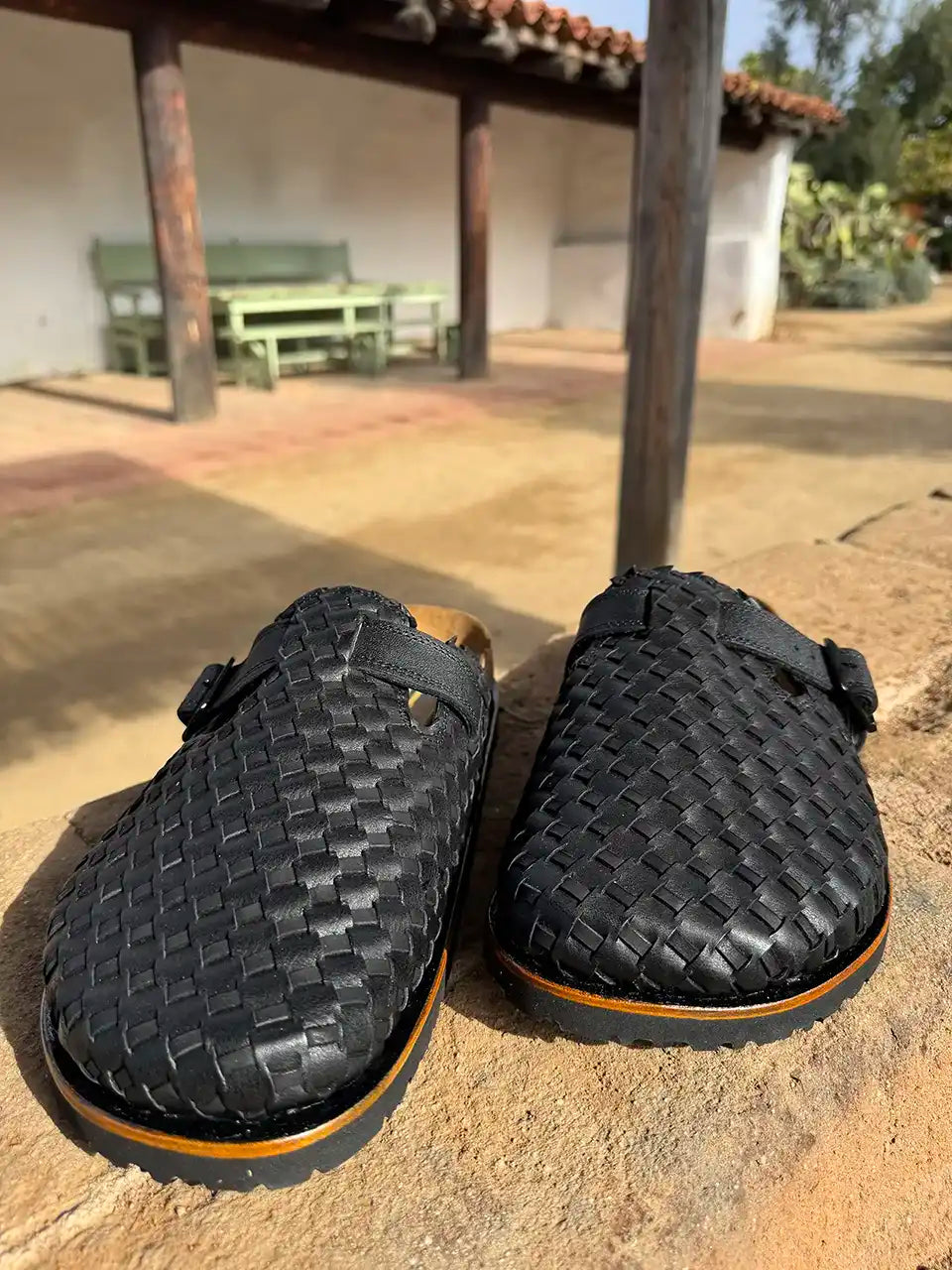 Botas Hasta La Muerte black Petatillo clogs with cork footbed and Vibram sole handcrafted in León Mexico.