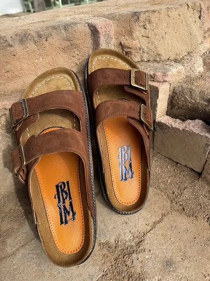 Botas Hasta La Muerte brown roughout cowhide huaraches with cork footbed and Vibram sole handcrafted in León Mexico.