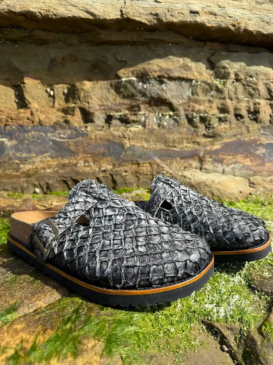 Botas Hasta La Muerte gray pirarucu leather clogs with cork footbed and Vibram sole handcrafted in León Mexico.