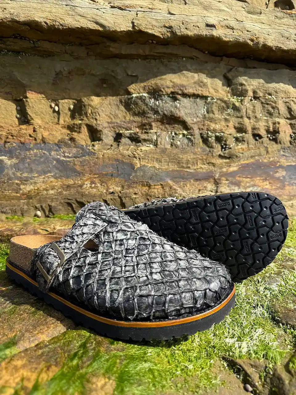 Botas Hasta La Muerte gray pirarucu leather clogs with cork footbed and Vibram sole handcrafted in León Mexico.