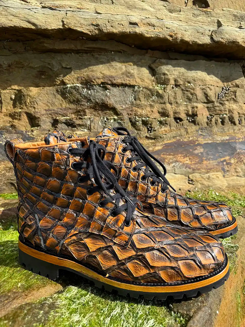 Botas Hasta La Muerte brown pirarucu leather lace up boots with Goodyear welt and lug soles handcrafted in León Mexico.