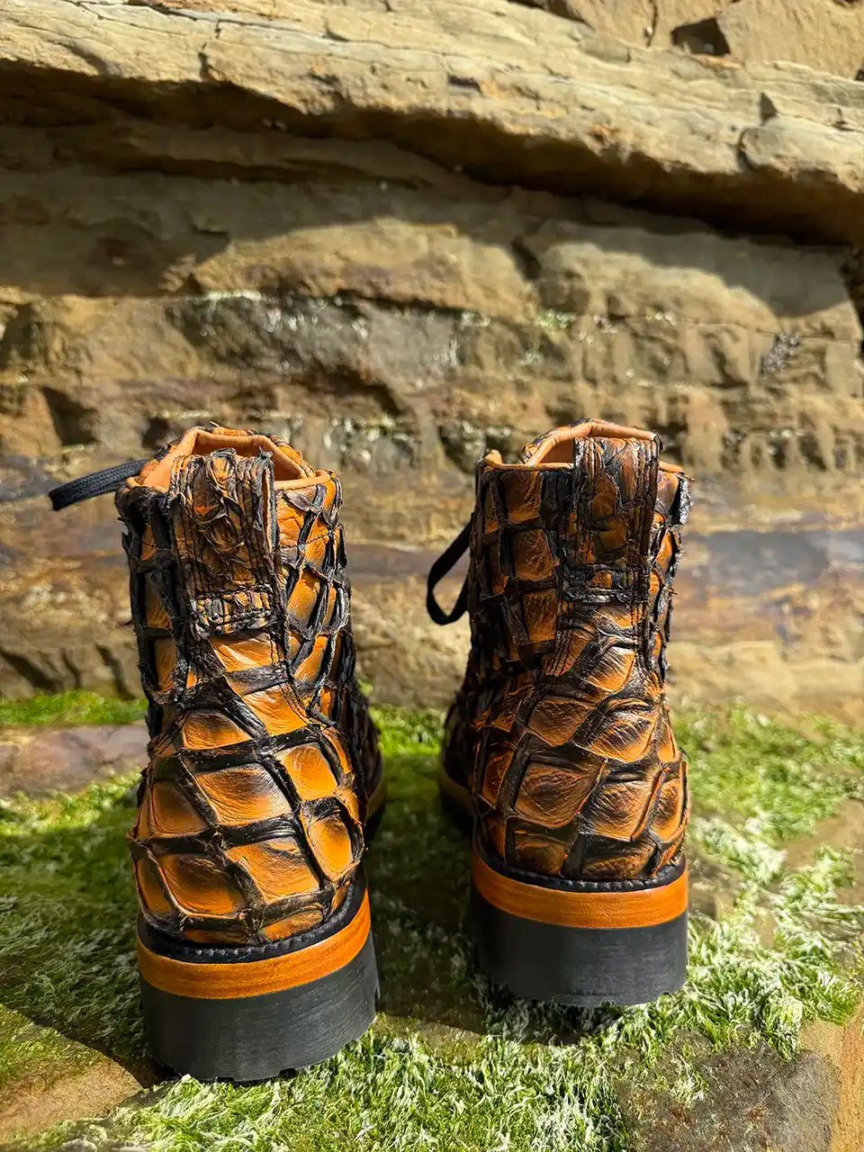 Botas Hasta La Muerte brown pirarucu leather lace up boots with Goodyear welt and lug soles handcrafted in León Mexico.