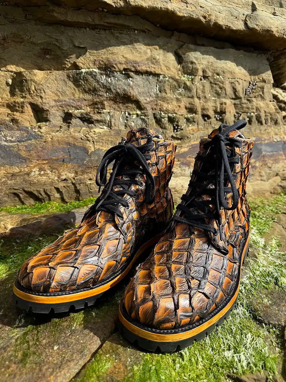 Botas Hasta La Muerte brown pirarucu leather lace up boots with Goodyear welt and lug soles handcrafted in León Mexico.