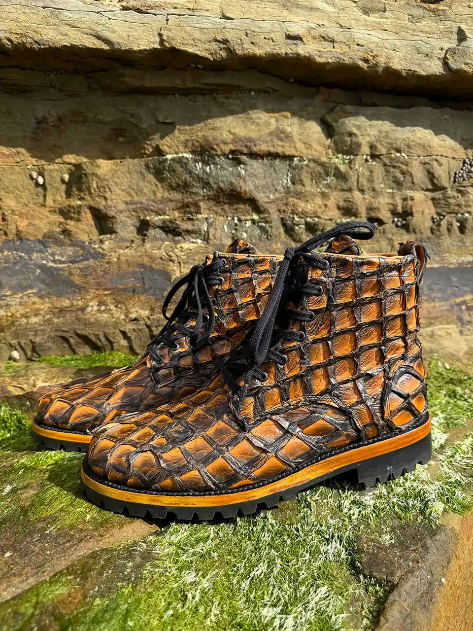 Botas Hasta La Muerte brown pirarucu leather lace up boots with Goodyear welt and lug soles handcrafted in León Mexico.