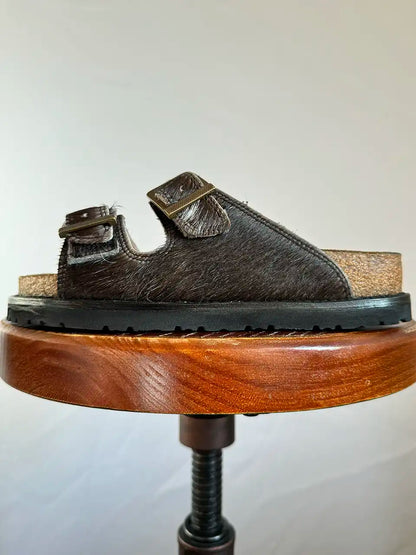 Botas Hasta La Muerte black cowhide huaraches with cork footbed and Vibram sole handcrafted in León Mexico.