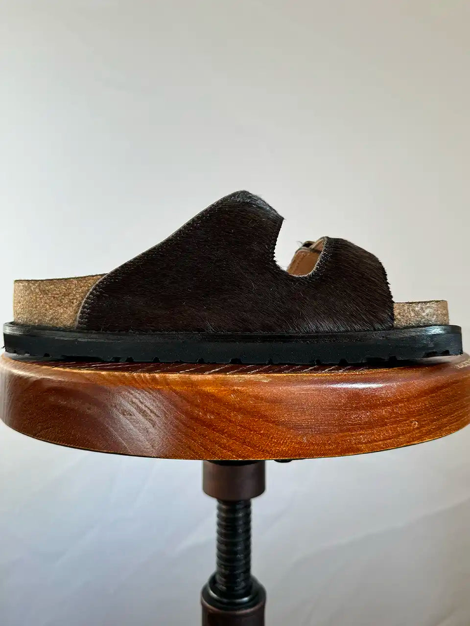 Botas Hasta La Muerte black cowhide huaraches with cork footbed and Vibram sole handcrafted in León Mexico.