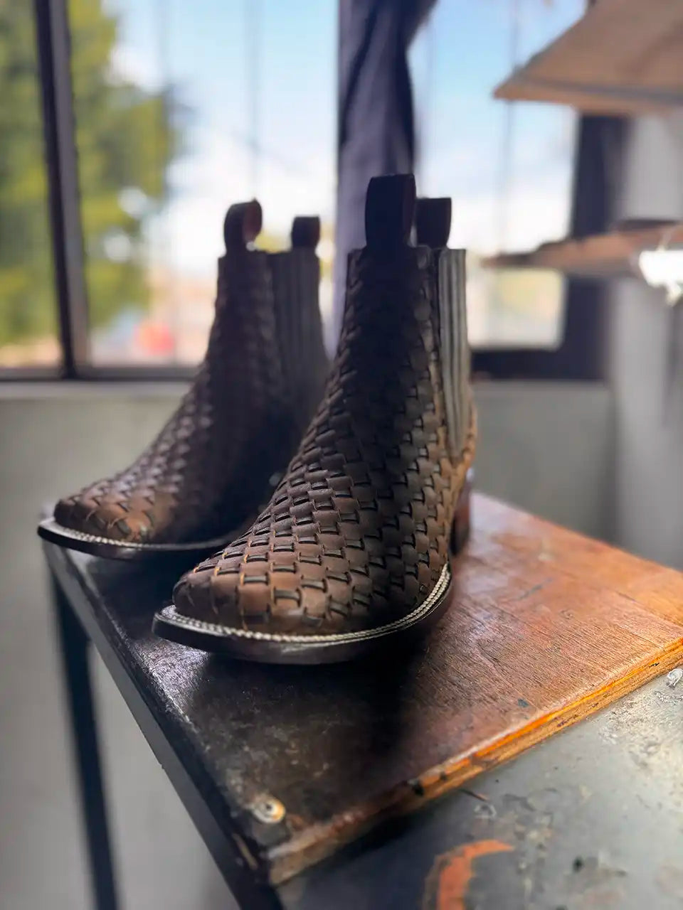 Botas Hasta La Muerte square toe Petatillo Chelsea boots with hand woven leather uppers handcrafted in León Mexico.