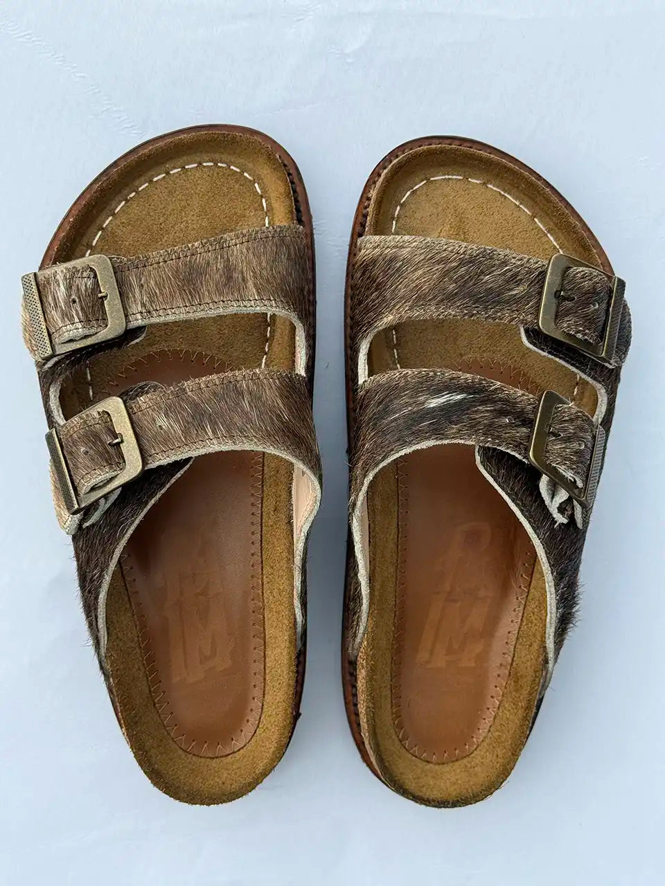 Botas Hasta La Muerte brown cowhide huaraches with cork footbed and Vibram sole handcrafted in León Mexico.