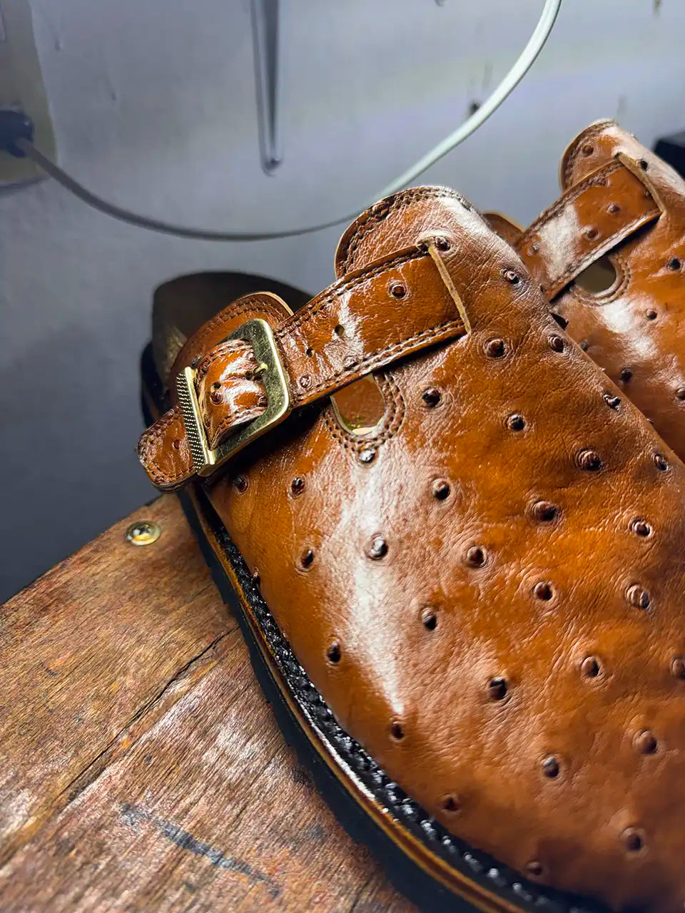 Botas Hasta La Muerte cognac brown full quill ostrich leather clogs with cork footbed and Vibram soles handcrafted in León Mexico.
