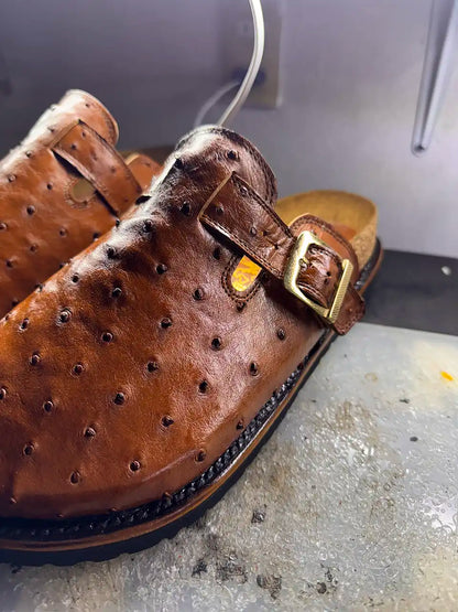 Botas Hasta La Muerte cognac brown full quill ostrich leather clogs with cork footbed and Vibram soles handcrafted in León Mexico.