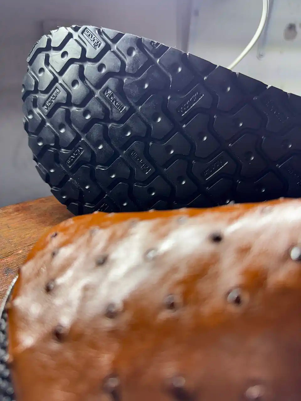 Botas Hasta La Muerte cognac brown full quill ostrich leather clogs with cork footbed and Vibram soles handcrafted in León Mexico.