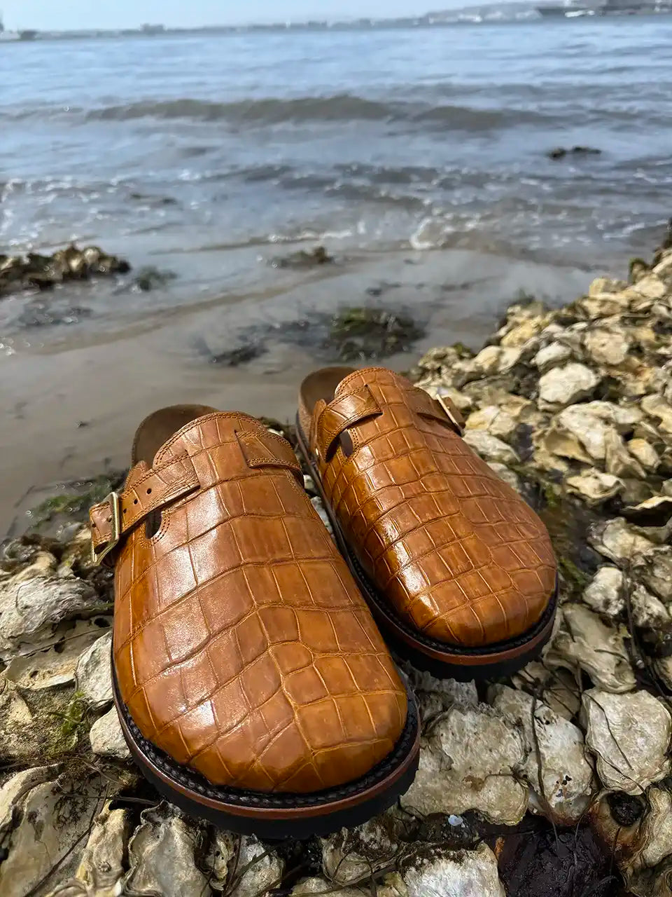 Honey alligator leather clogs with cork footbed, Vibram sole, and vegetable tanned midsole handcrafted in León Mexico.