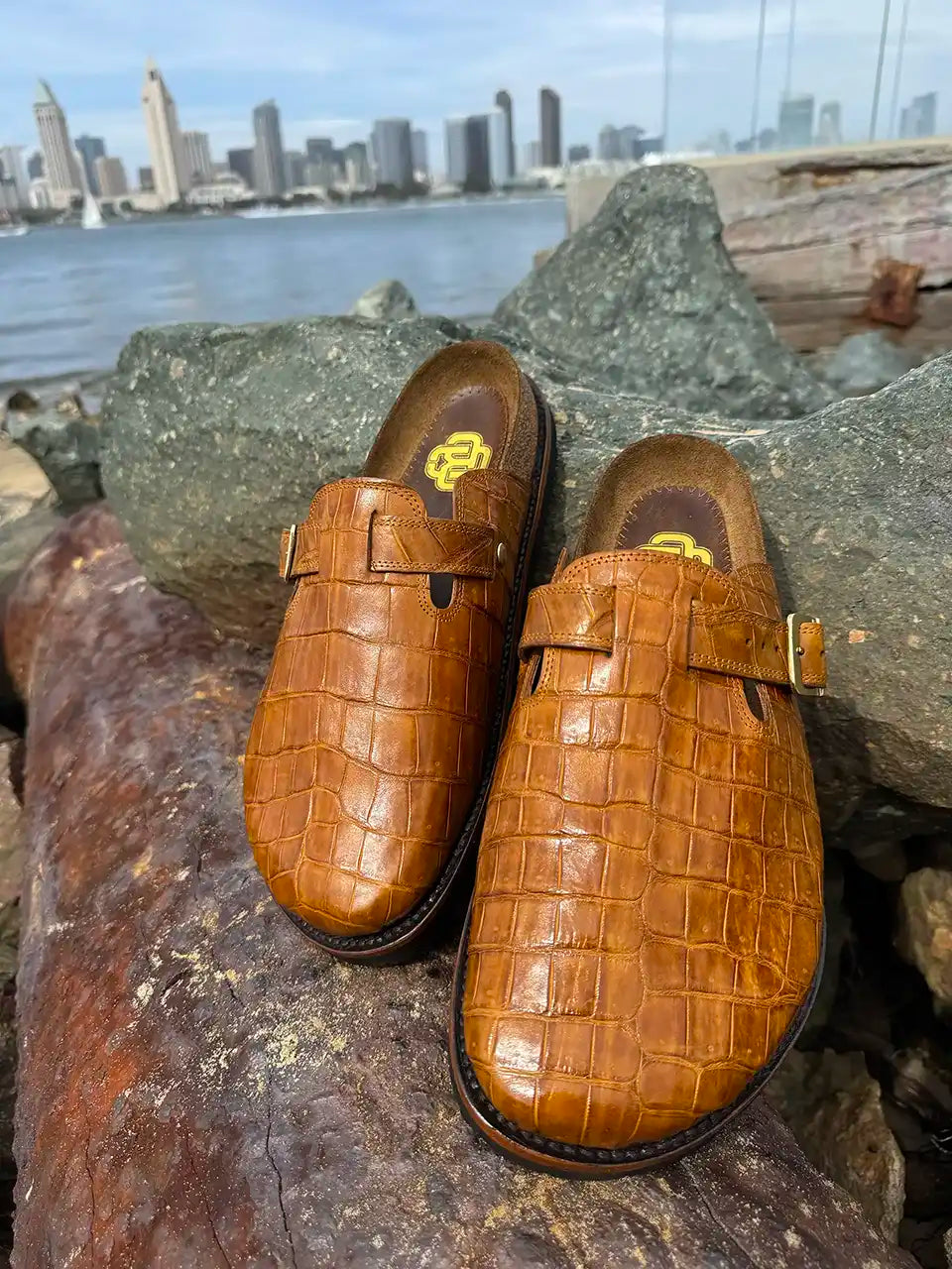 Honey alligator leather clogs with cork footbed, Vibram sole, and vegetable tanned midsole handcrafted in León Mexico.
