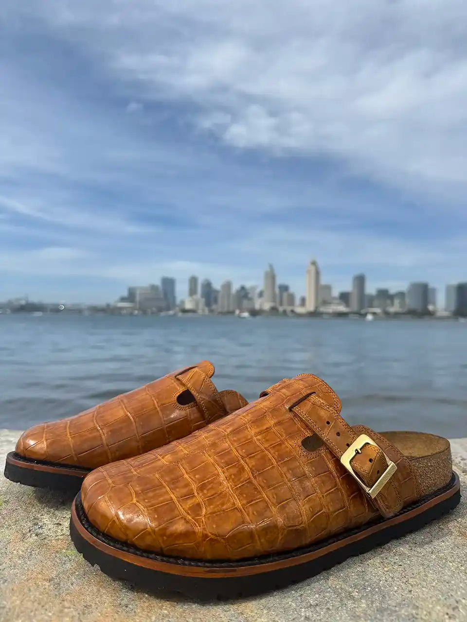 Honey alligator leather clogs with cork footbed, Vibram sole, and vegetable tanned midsole handcrafted in León Mexico.