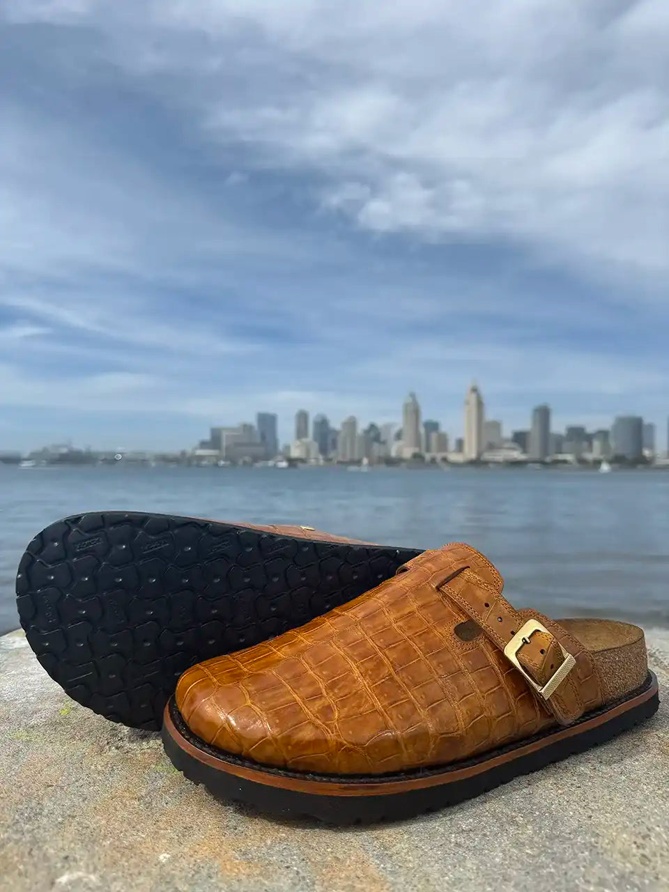 Honey alligator leather clogs with cork footbed, Vibram sole, and vegetable tanned midsole handcrafted in León Mexico.