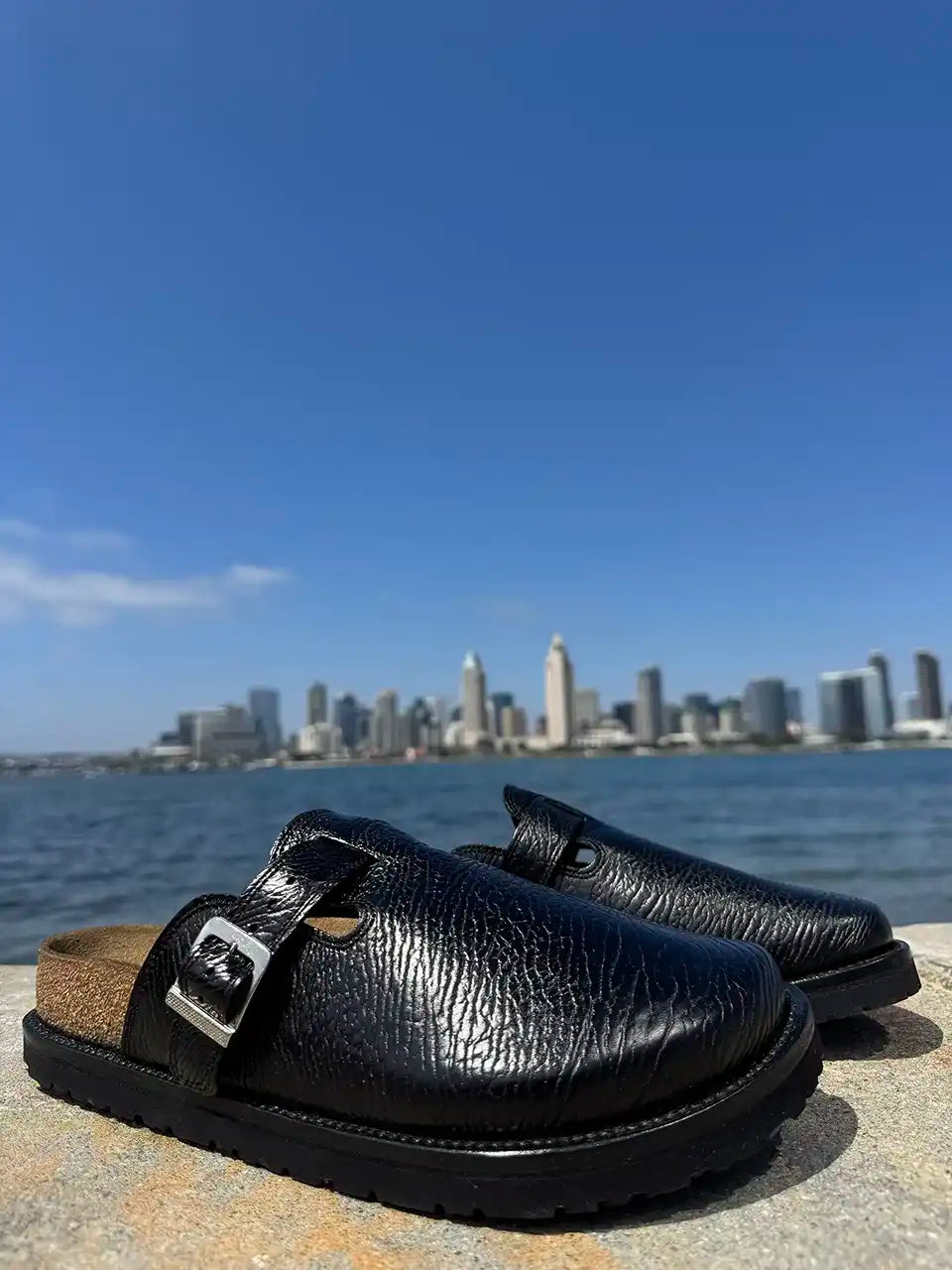 Black shark leather clogs with cork footbed and Vibram sole handcrafted in León Mexico. Botas Hasta La Muerte