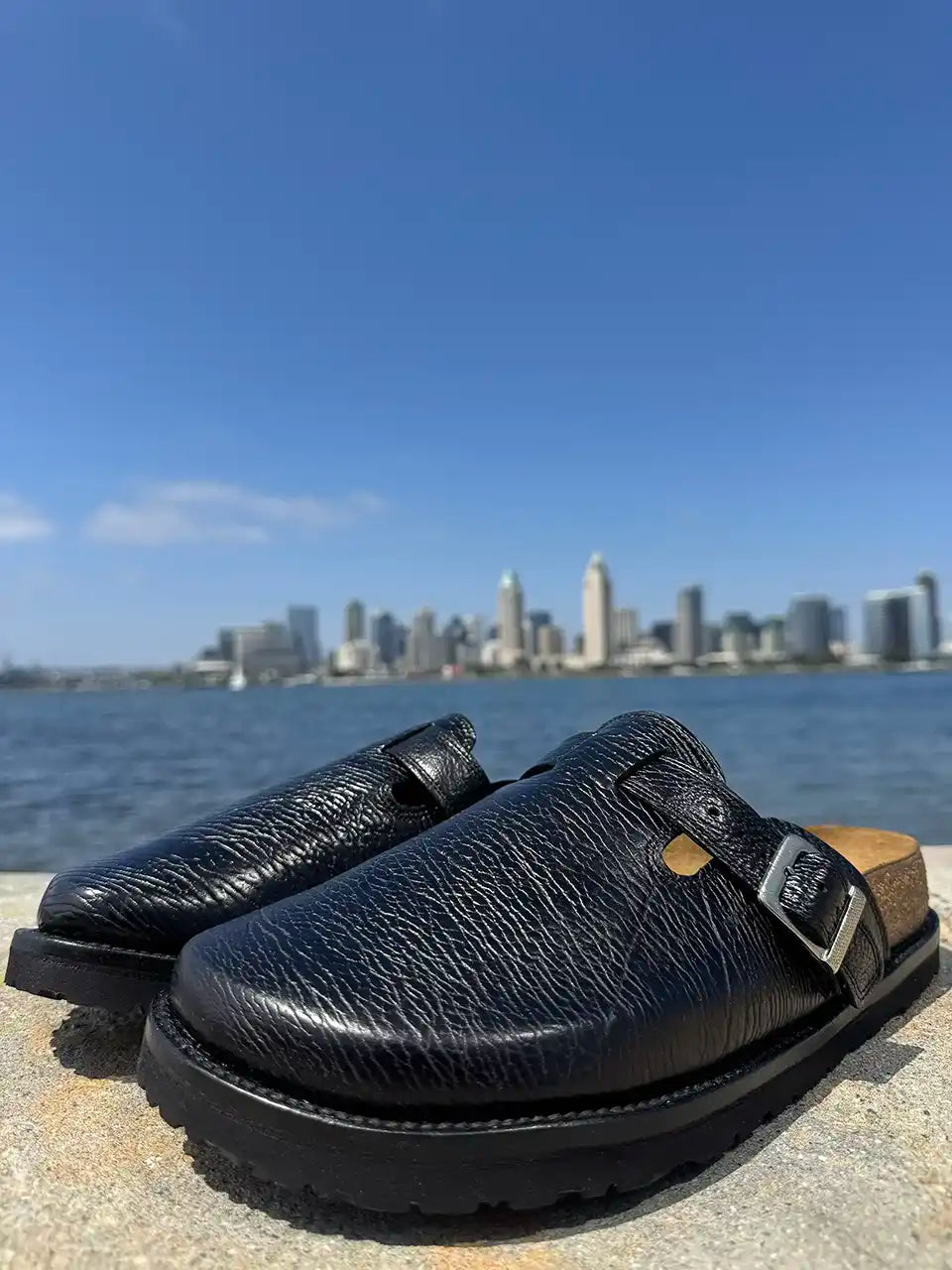 Black shark leather clogs with cork footbed and Vibram sole handcrafted in León Mexico. Botas Hasta La Muerte