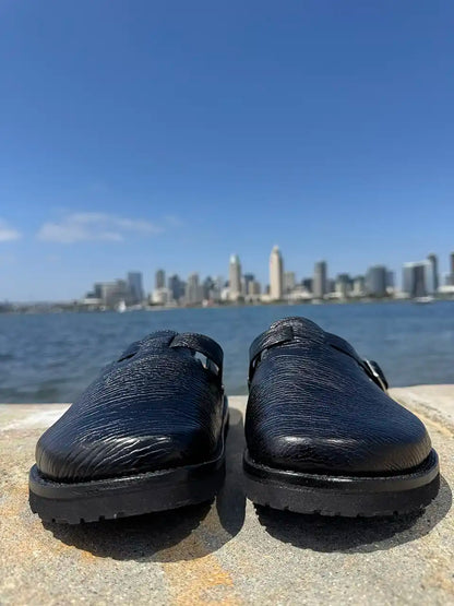 Black shark leather clogs with cork footbed and Vibram sole handcrafted in León Mexico. Botas Hasta La Muerte