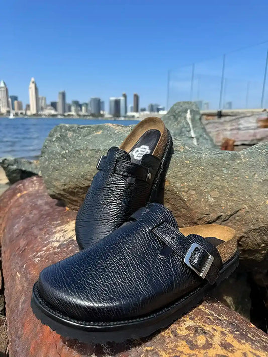 Black shark leather clogs with cork footbed and Vibram sole handcrafted in León Mexico. Botas Hasta La Muerte