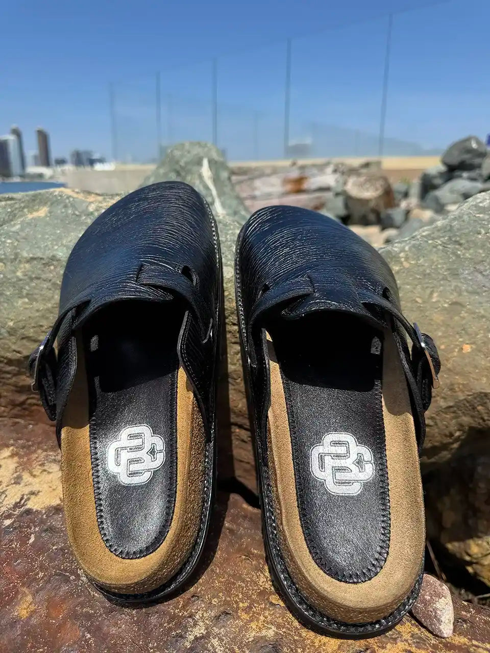 Black shark leather clogs with cork footbed and Vibram sole handcrafted in León Mexico. Botas Hasta La Muerte