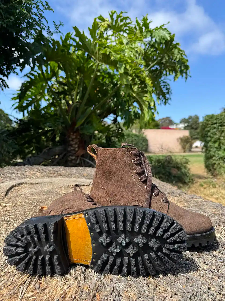Botas Hasta La Muerte brown roughout leather lace up boots with Goodyear welt and lug soles handcrafted in León Mexico.