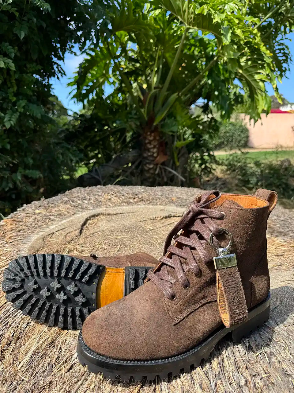 Botas Hasta La Muerte brown roughout leather lace up boots with Goodyear welt and lug soles handcrafted in León Mexico.